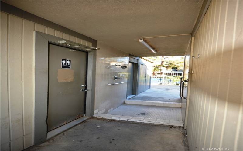 Shower facilities in both pool areas