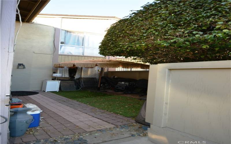 The Welcoming front patio of this lovely townhome is perfect for a private BBQ