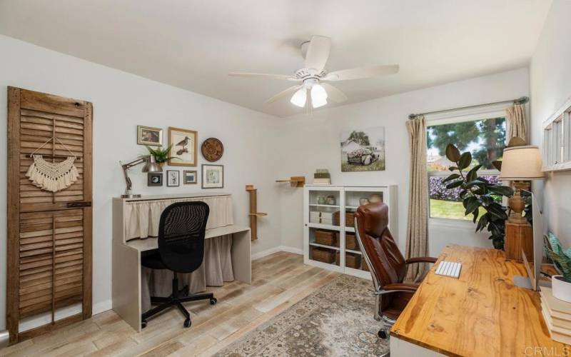 This is a secondary bedroom that the owner is using as an office.