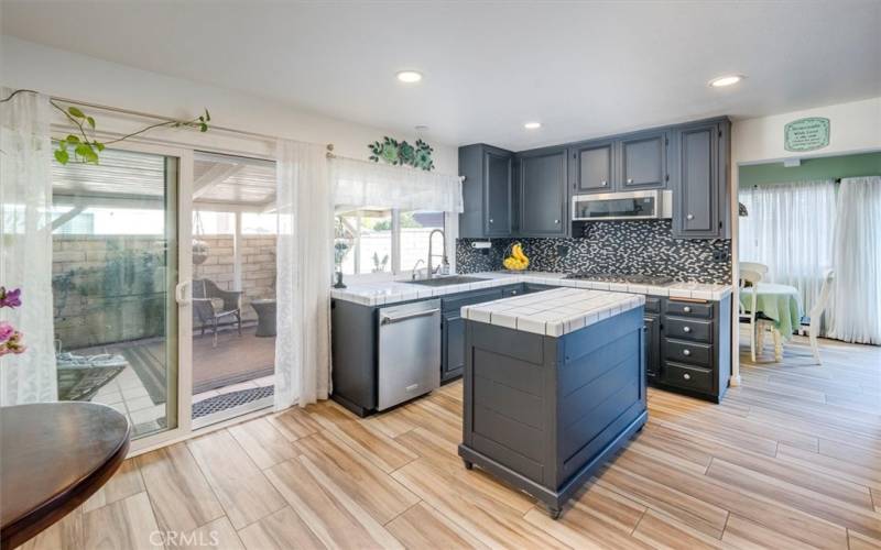 Dining off Kitchen & Newer Dual Pane Sliding doors to Pat