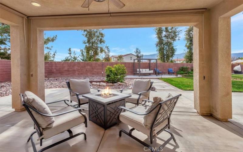 Covered patio provides great entertainment space.