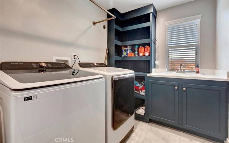 Separate laundry room upstairs.