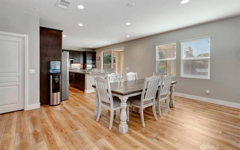 Dining area is open to the kitchen and family area.