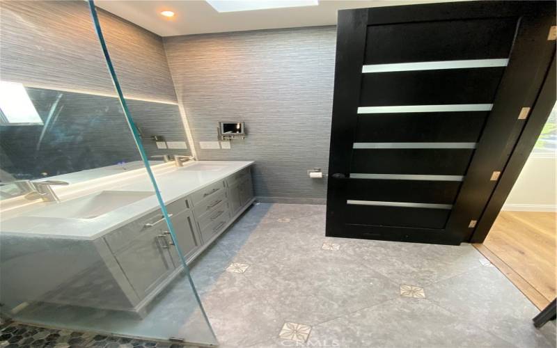 master bathroom with custom modern shower, double sinks