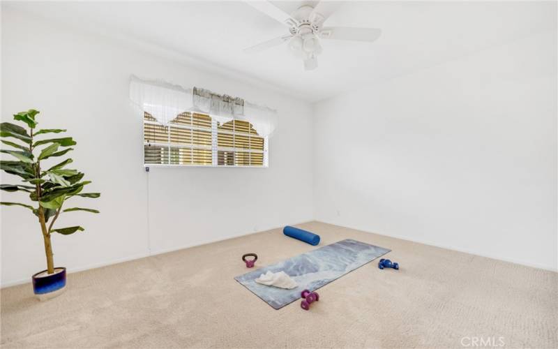 Another bedroom behind the Kitchen, easily holds a Queen size bed.