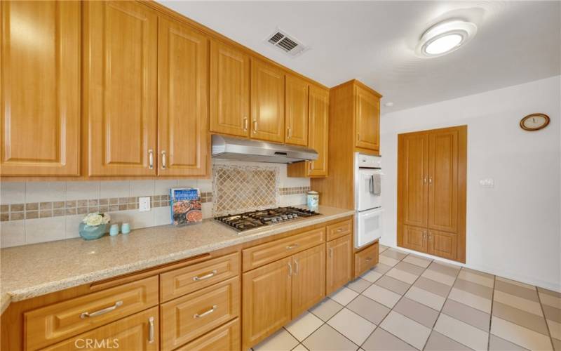 Built in pantry,  lower cabinets have pull outs