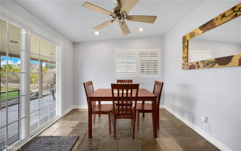 Lovely eat in kitchen which looks towards the backyard.