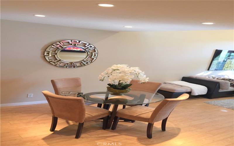 Dining area which is open to living room and kitchen. Perfect for entertaining