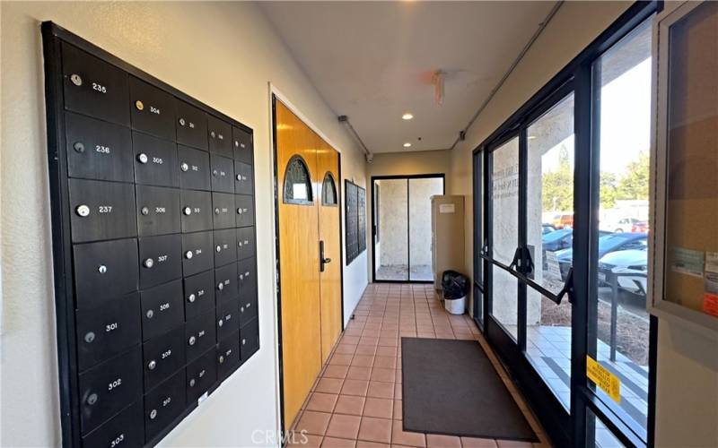 Front Entry and Mail Boxes with Common Area down the hall.