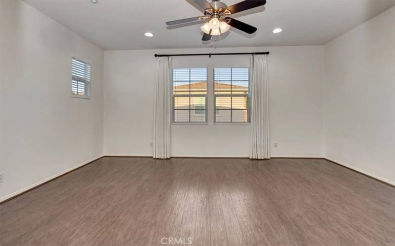 Existing primary bedroom is very large, light and bright