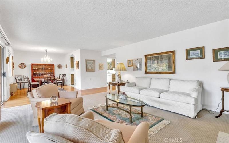 The living room flows off the dining area for ease of entertaining.