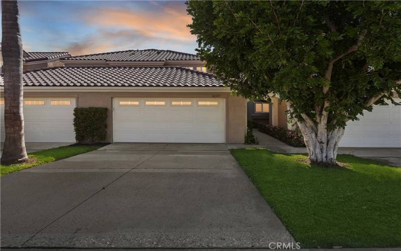 Front view of home with sunset