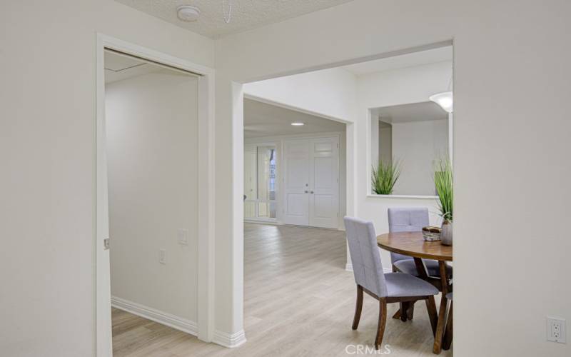 View of the dining area from the guest bedroom. This entry can be altered for increased privacy.