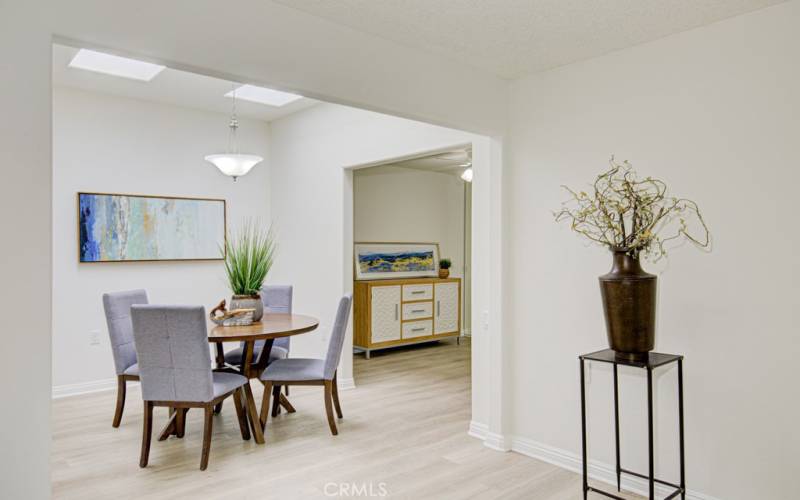 Dining room features two large skylights. Entry to second bedroom is adjacent to dining room. Entry to bedroom can be modified to add privacy.