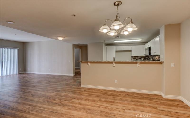 Open floorplan showing dining area, living room, kitchen and breakfast bar