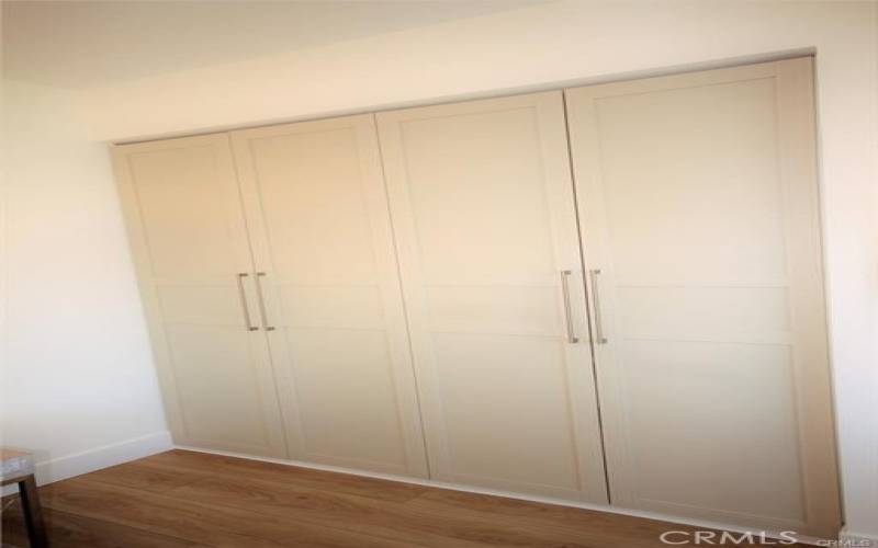 Spacious custom wardrobe closet with lots of cubbies and drawers for all your personal items and cloths.