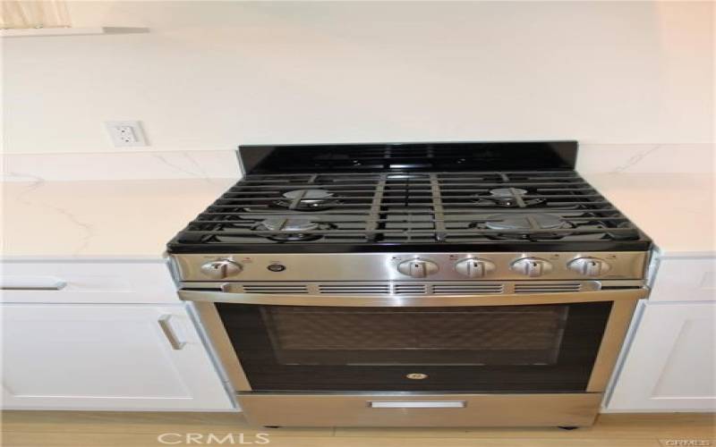 Gas four burner stove/oven.