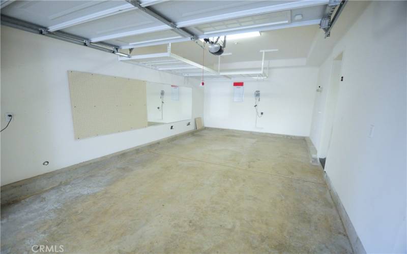 Inside of inner garage with direct access to unit and to front garage.