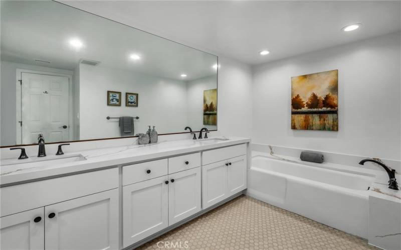 Master Bath with bathtub and dual sinks