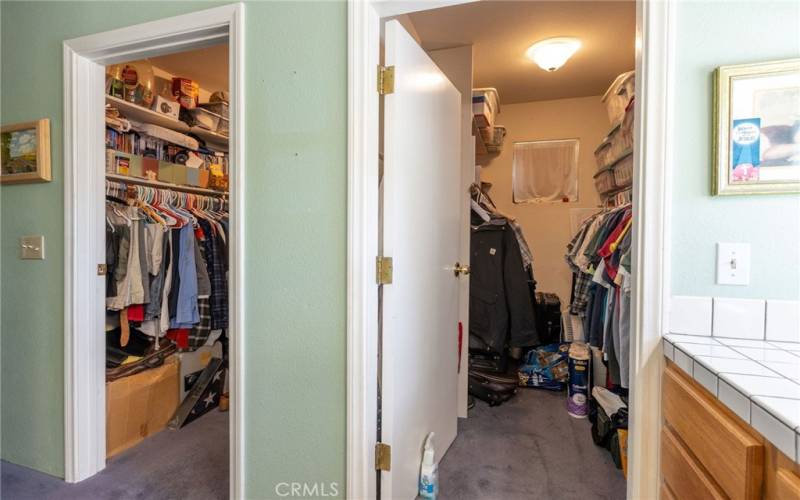 Primary Bedroom His & Her Closets.