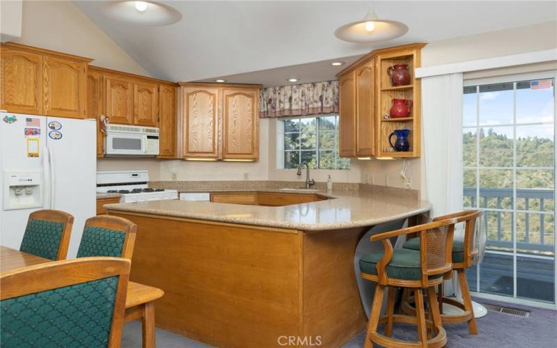 Open Concept Kitchen with Granite Counter tops.