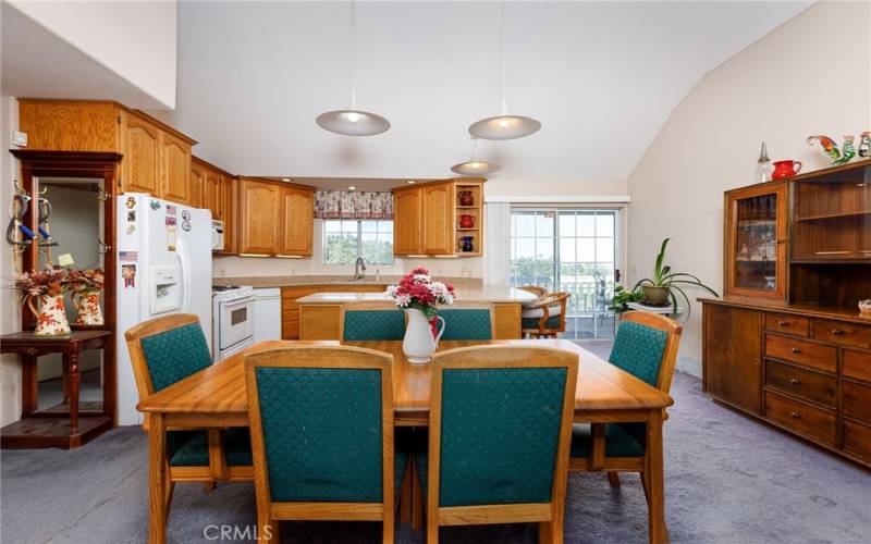 Open Concept Kitchen - Dining Area. Leading to Deck.