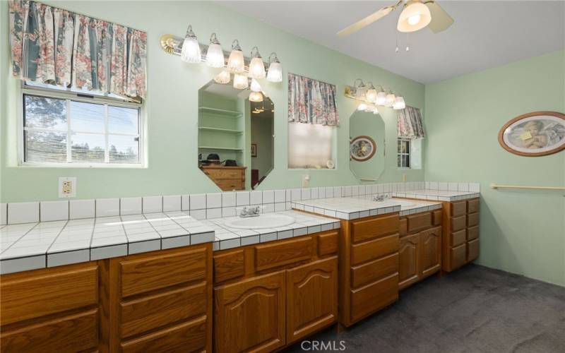 Primary Bathroom Vanity Double Sinks. Lots of Natural Light.