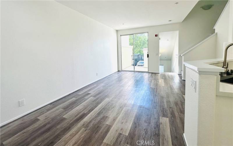 Another angle of living/dining room overlooking private patio