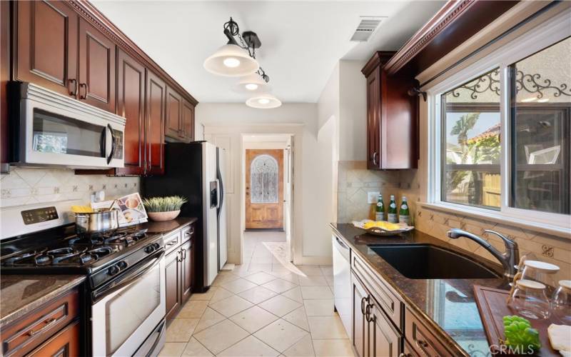 Kitchen with Granite Counters and Tile Floor