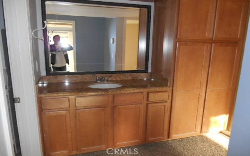 Bathroom 2 with storage cabinet