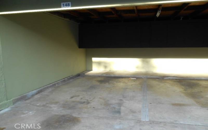 Carport with storage unit