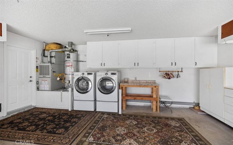 Closer view of garage with washer and dryer