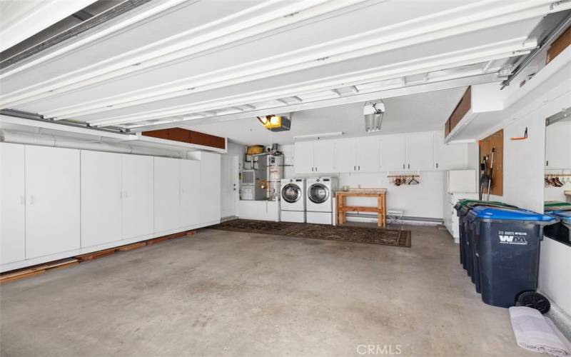 2 car attached garage with storage cabinets