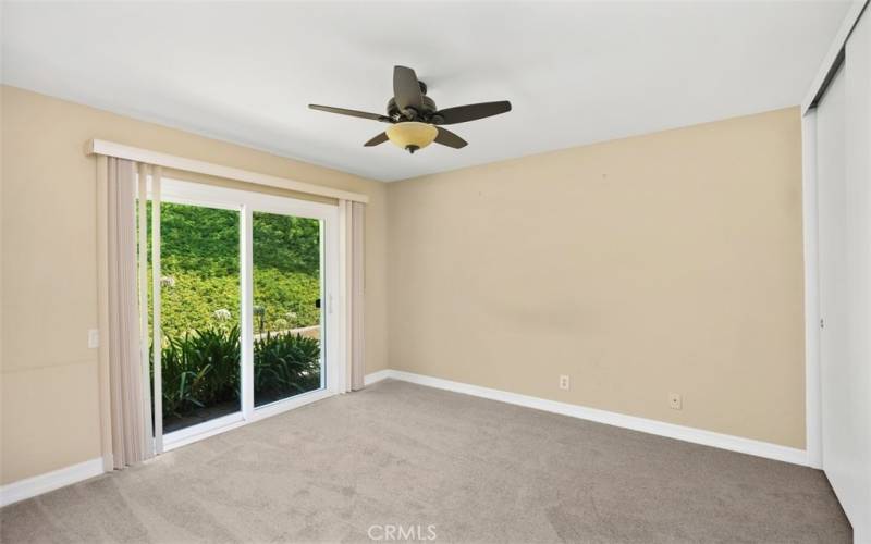 Secondary bedroom with new carpeting.