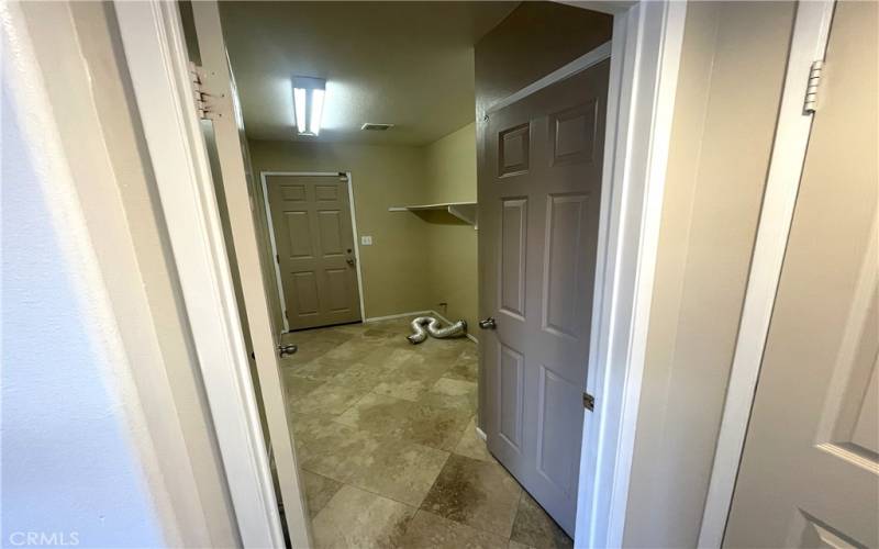 Laundry Room with access to garage