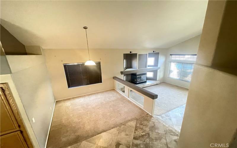 Looking Down the Stairs to Dining and Living Rooms