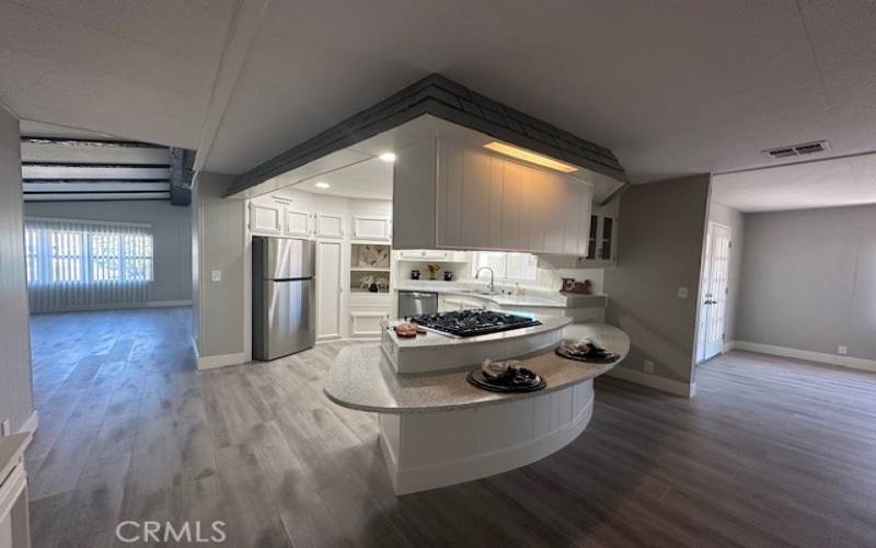 Kitchen breakfast bar and lighting.