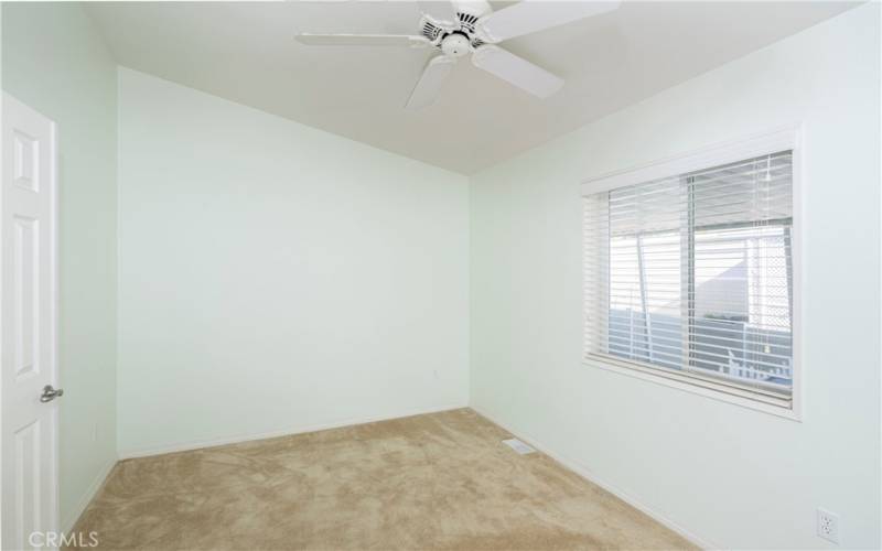 Bedroom with french doors used as an office