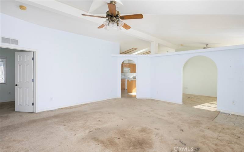 The office bedroom, kitchen and formal dining room are off this main room.