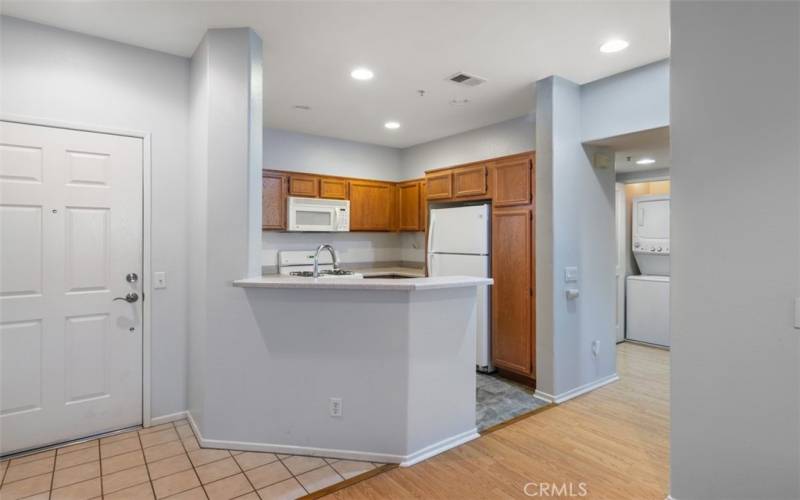 Natural flow from the living room into the kitchen allows you to chat while cooking up hot delicous meals for your guests.