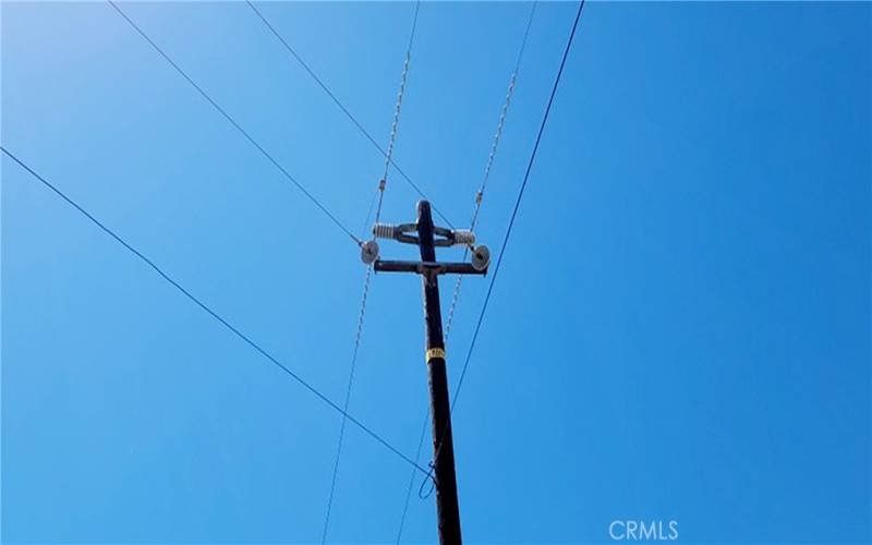 Hot Electric Pole showing wires attached