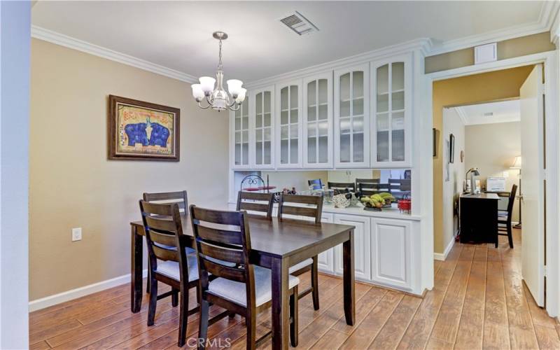 DINING AREA & DOOR TO DOWNSTAIRS BEDROOM