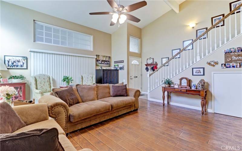 LIVING ROOM FRONT DOOR & WINDOW/DOORS TO PATIO