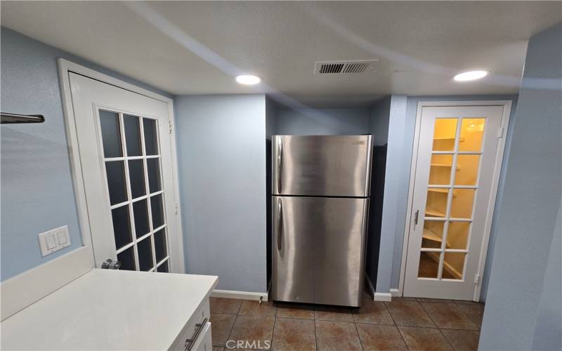 Refrigerator and walk-in pantry