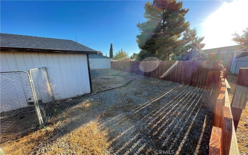 behind detached garage