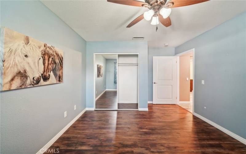 3rd bedroom with door to backyard