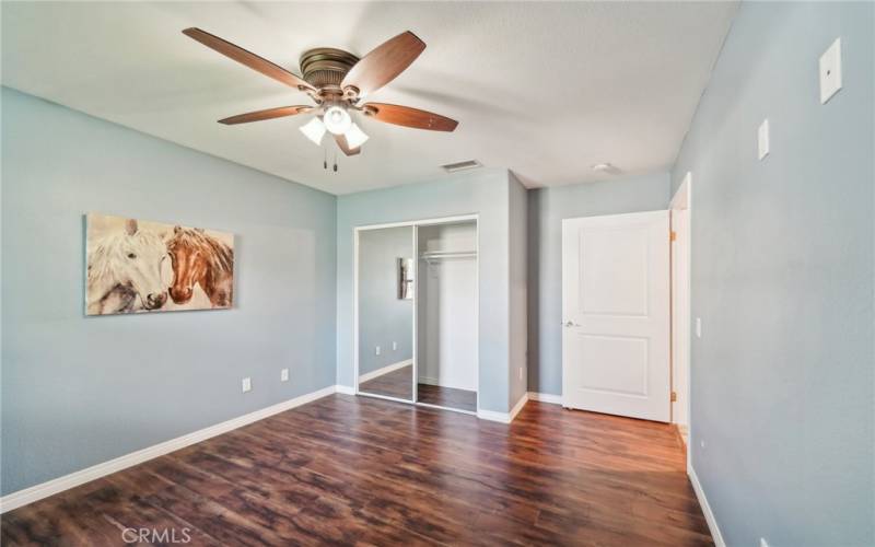 3rd bedroom with door to backyard