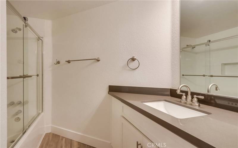 Full bath with quartz countertop