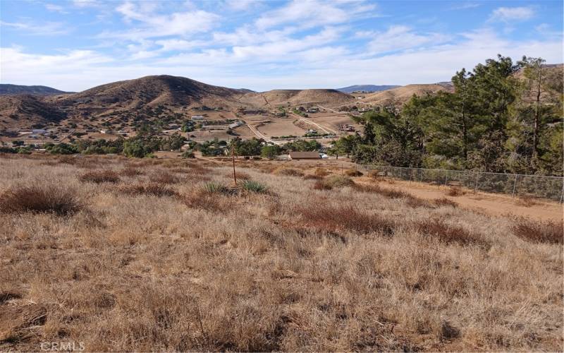 View of the valley. Property end at the of the fence.