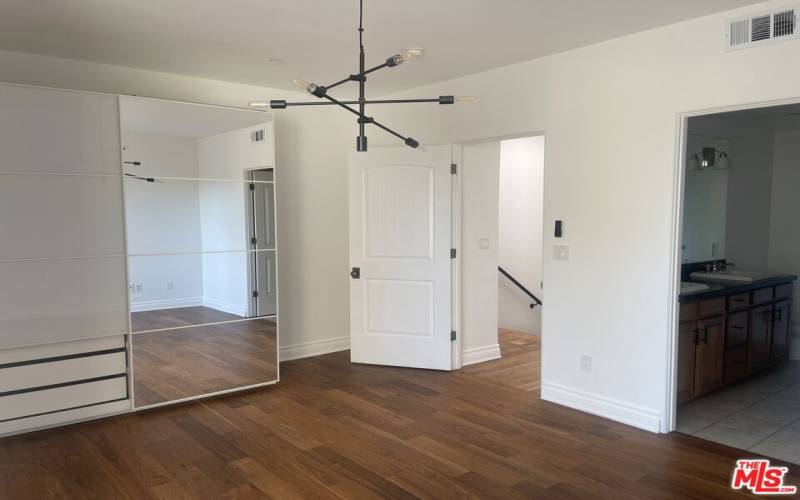 Master Bedroom with Built-in Armoire storage